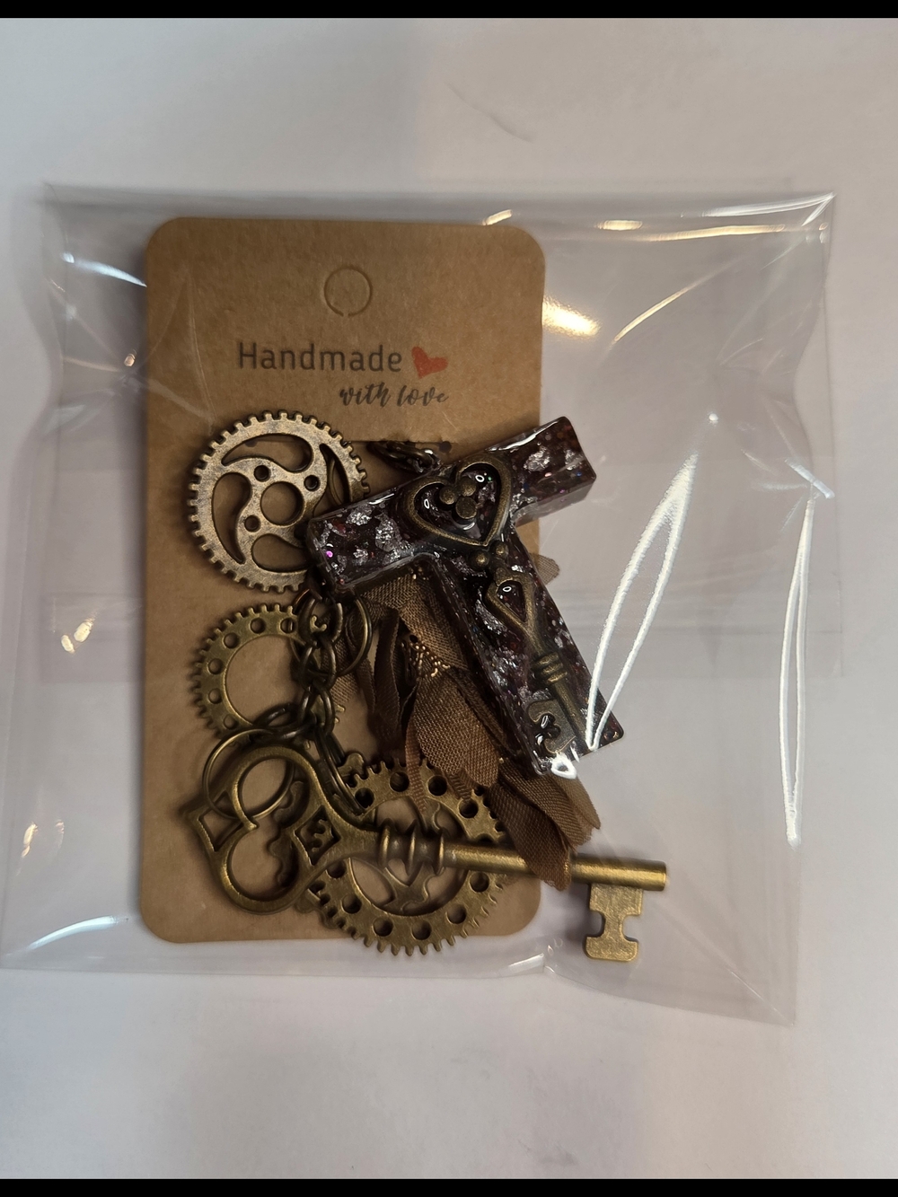 Steampunk-Inspired Brown Resin letter "T" Keychain with Gears, a Key & Tassel - Picture 8 of 9